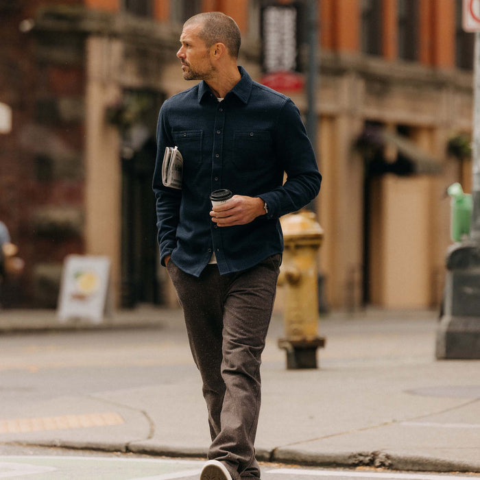 fit model walking wearing The Utility Shirt in Navy Sashiko