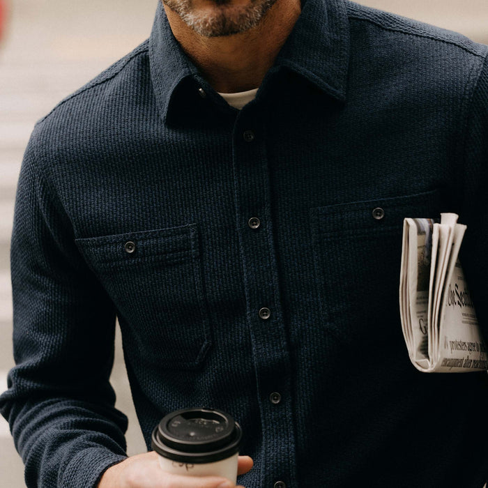 fit model showing off buttons on The Utility Shirt in Navy Sashiko