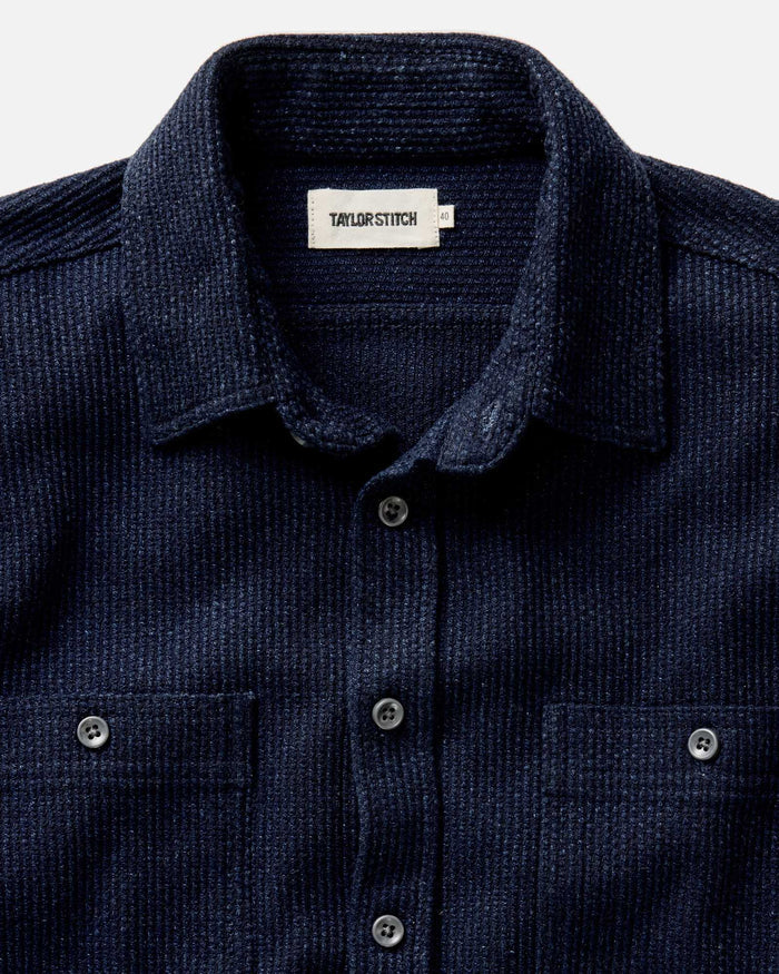 fit model showing off the back of The Utility Shirt in Rinsed Indigo Sashiko