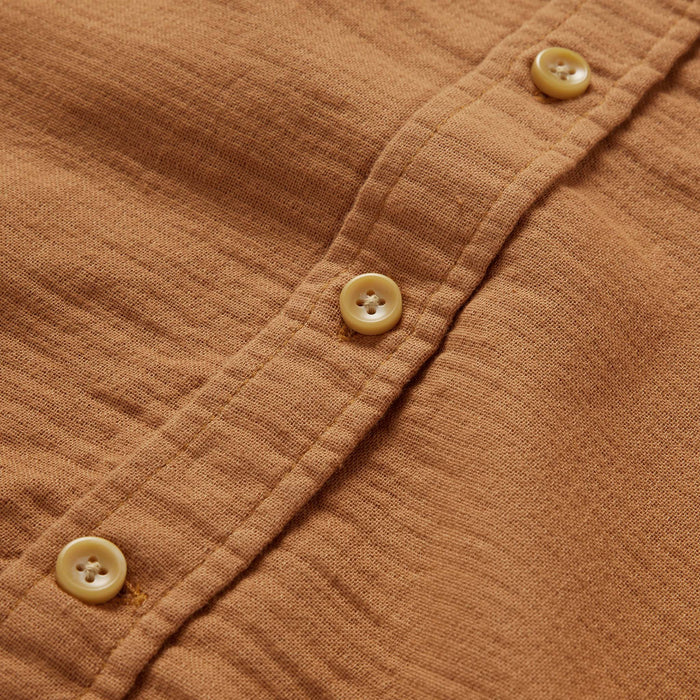 material shot of the buttons on The Utility Shirt in Russet Double Cloth