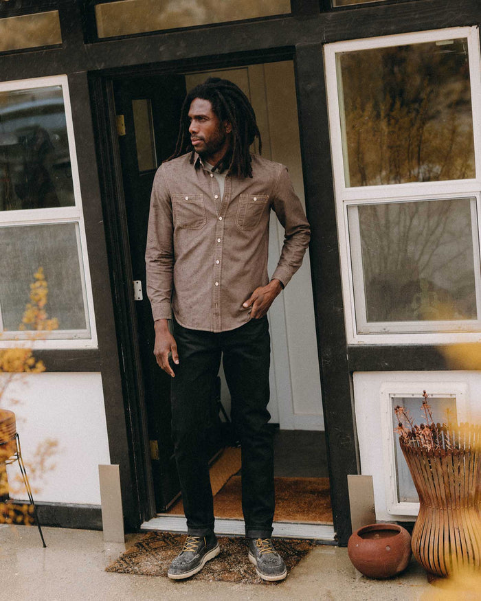 fit model showing off The Utility Shirt in Soil Nep