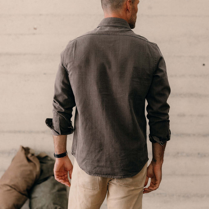 fit model showing off the back of The Utility Shirt in Soil Selvedge Denim