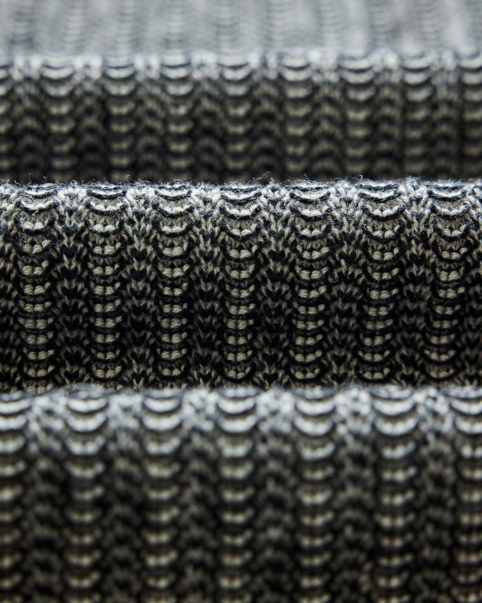 fabric shot of The Valencia Sweater Polo in Coal Scallop