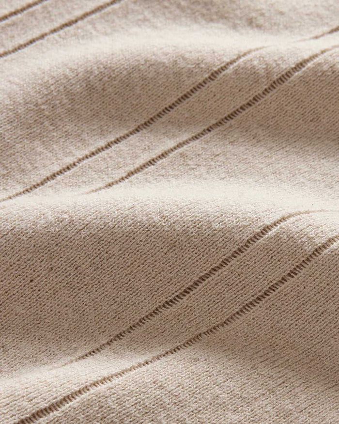 material shot of the details on The Valencia Sweater Polo in Heather Oat Rib
