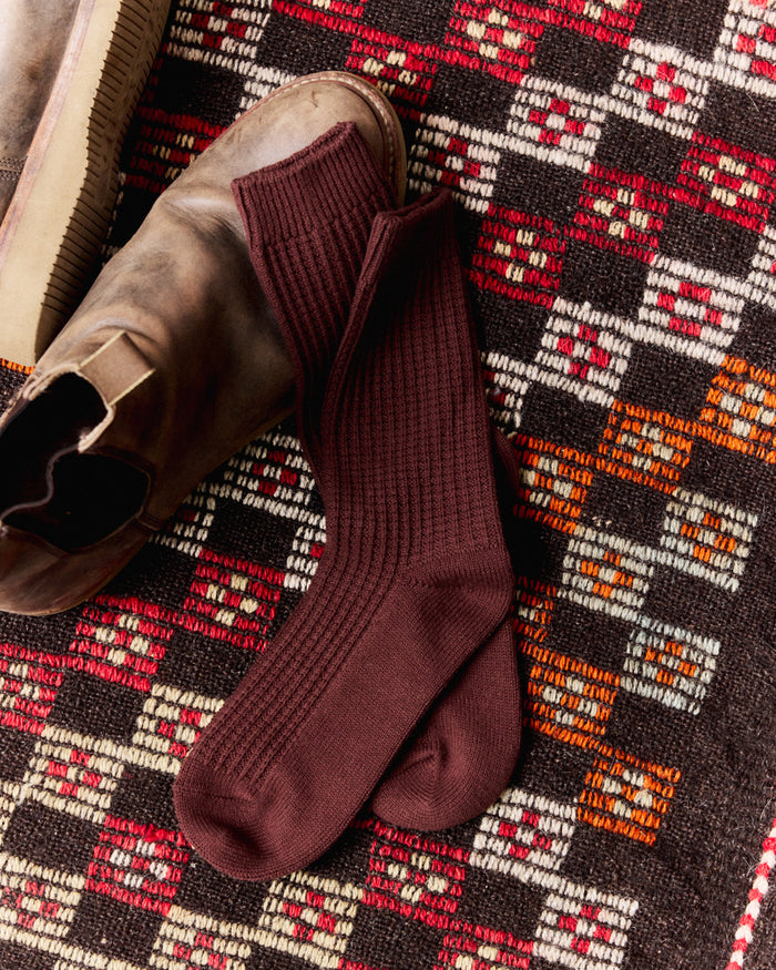 editorial flatlay of The Waffle Sock in Burgundy