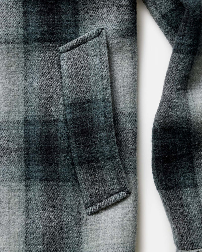 material shot of the pocket on The Waterfront Jacket in Evergreen Plaid Wool