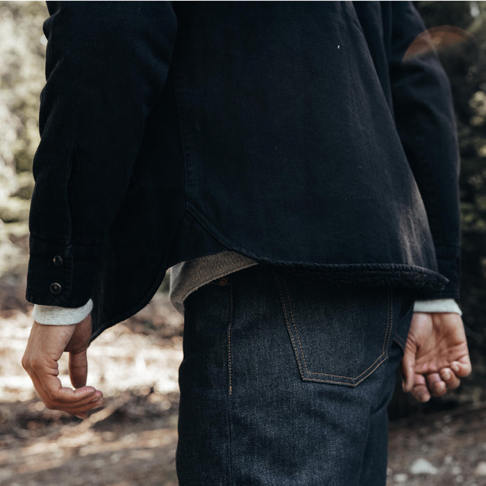 fit model showing off bottom of The Western Shirt Jacket in Washed Coal