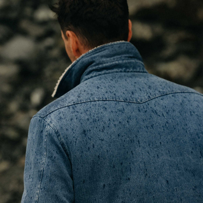 fit model posing in The Western Shirt Jacket in Washed Indigo