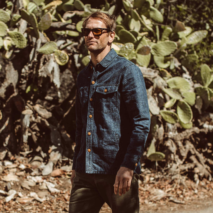 Our fit model walking along some plants.