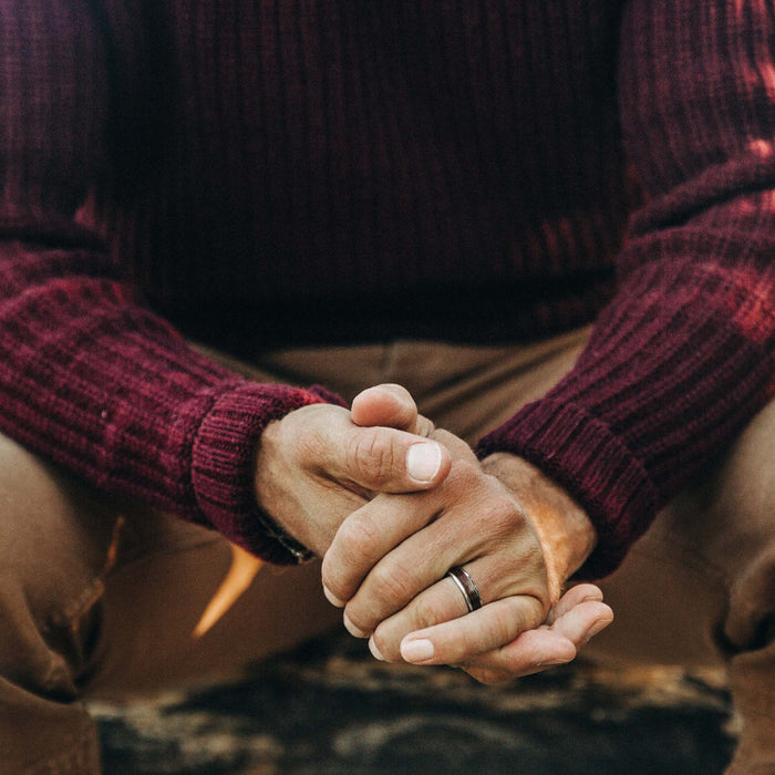 fit model wearing The Wharf Sweater in Burgundy with hands clasped