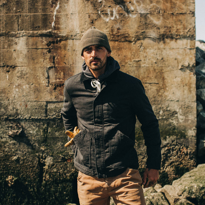 fit model wearing The Workhorse Jacket in Coal Boss Duck, hand in pocket