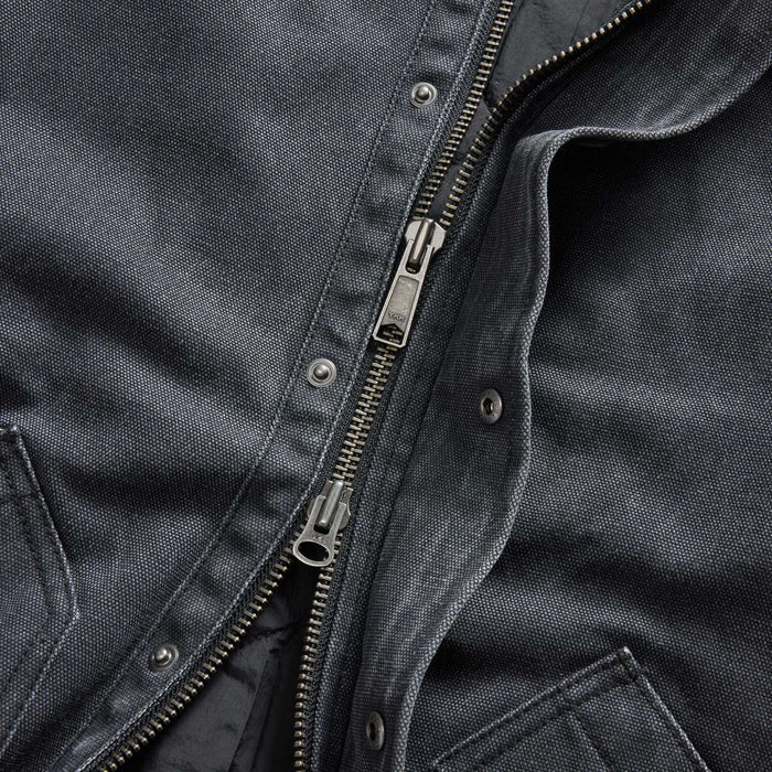 material shot of the zipper on The Workhorse Jacket in Coal Chipped Canvas