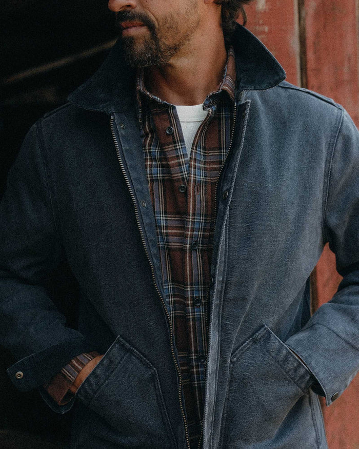 fit model showing the side pockets on The Workhorse Jacket in Navy Chipped Canvas