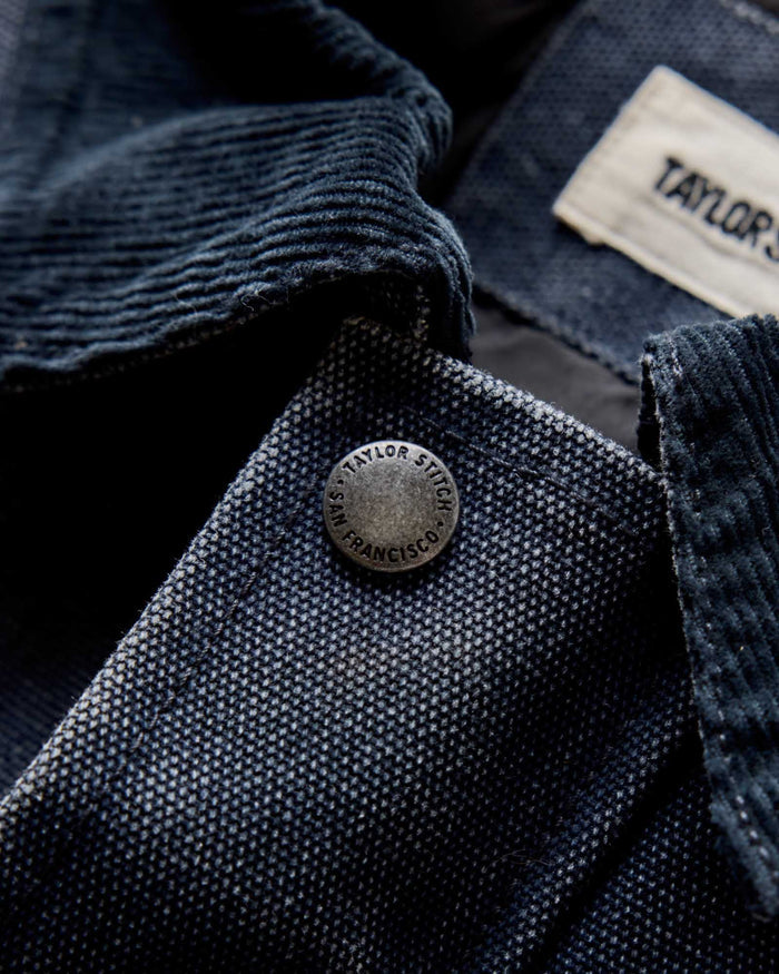 flatlay of The Workhorse Jacket in Navy Chipped Canvas, shown open