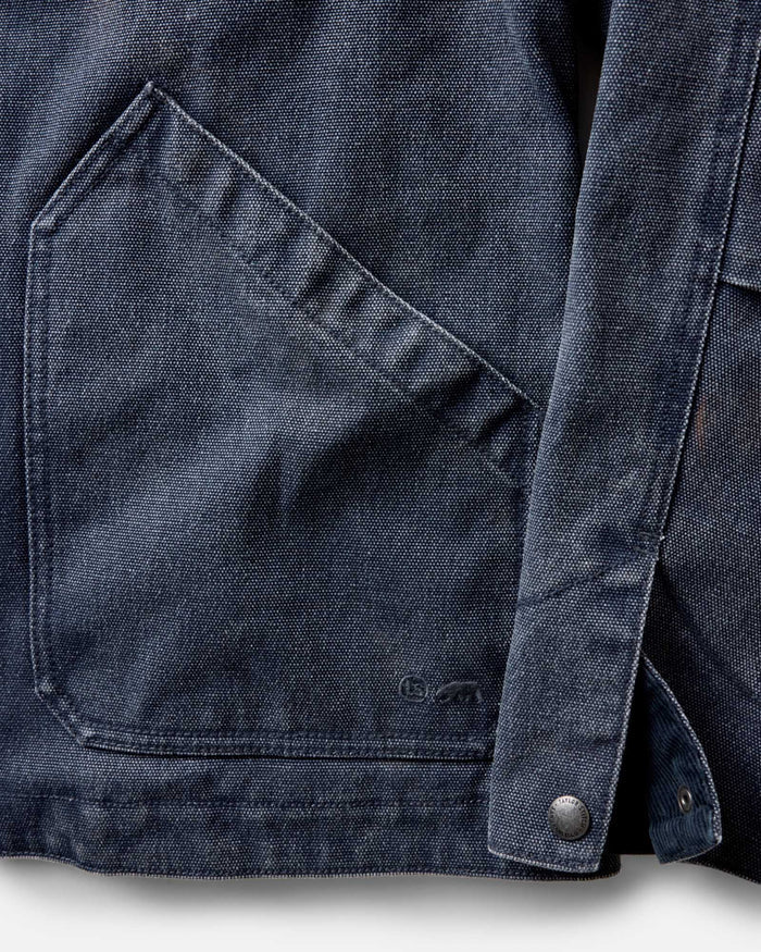 flatlay of The Workhorse Jacket in Navy Chipped Canvas, from the back