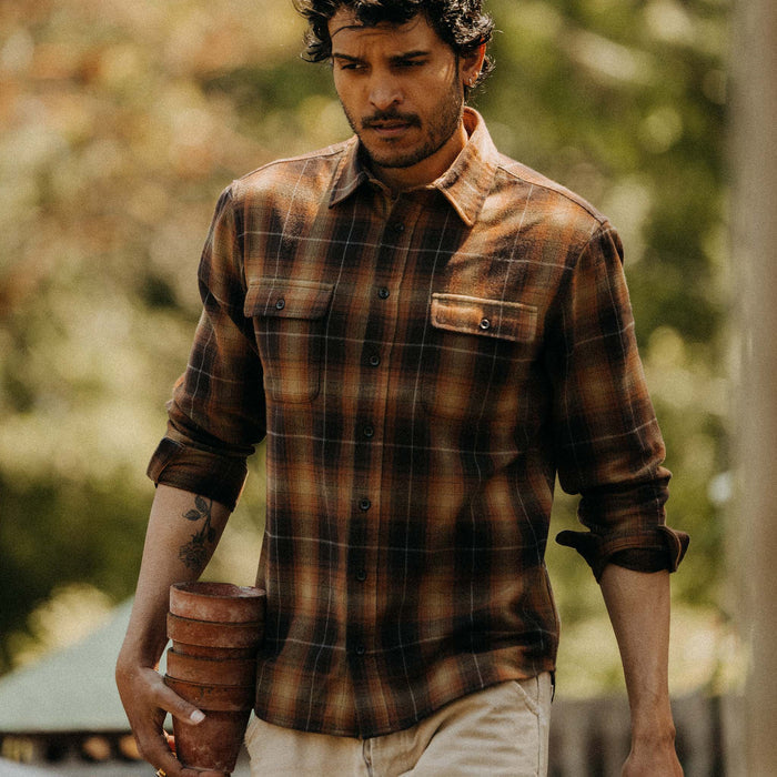 fit model walking wearing The Yosemite Shirt in Bonfire Plaid