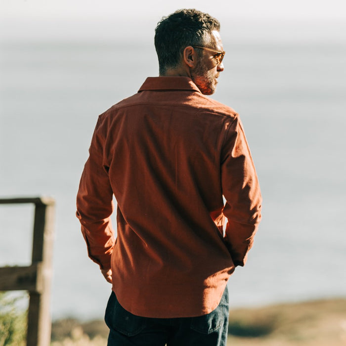 Our fit model wearing The Yosemite Shirt in Dusty Red by Taylor Stitch.