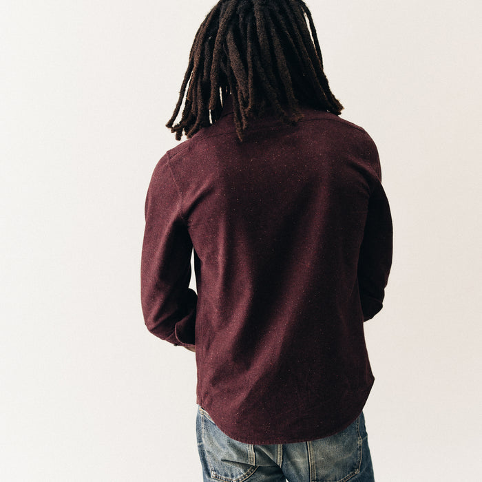 fit model showing off the back of The Yosemite Shirt in Nutmeg Donegal