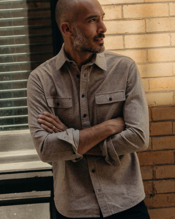 fit model with his arms crossed wearing The Yosemite Shirt in Oat Donegal