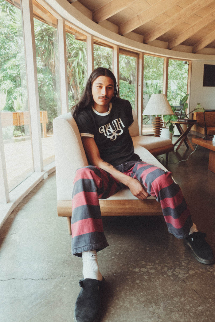 Man wearing Truth ringer tee shirt by The Bee & The Fox