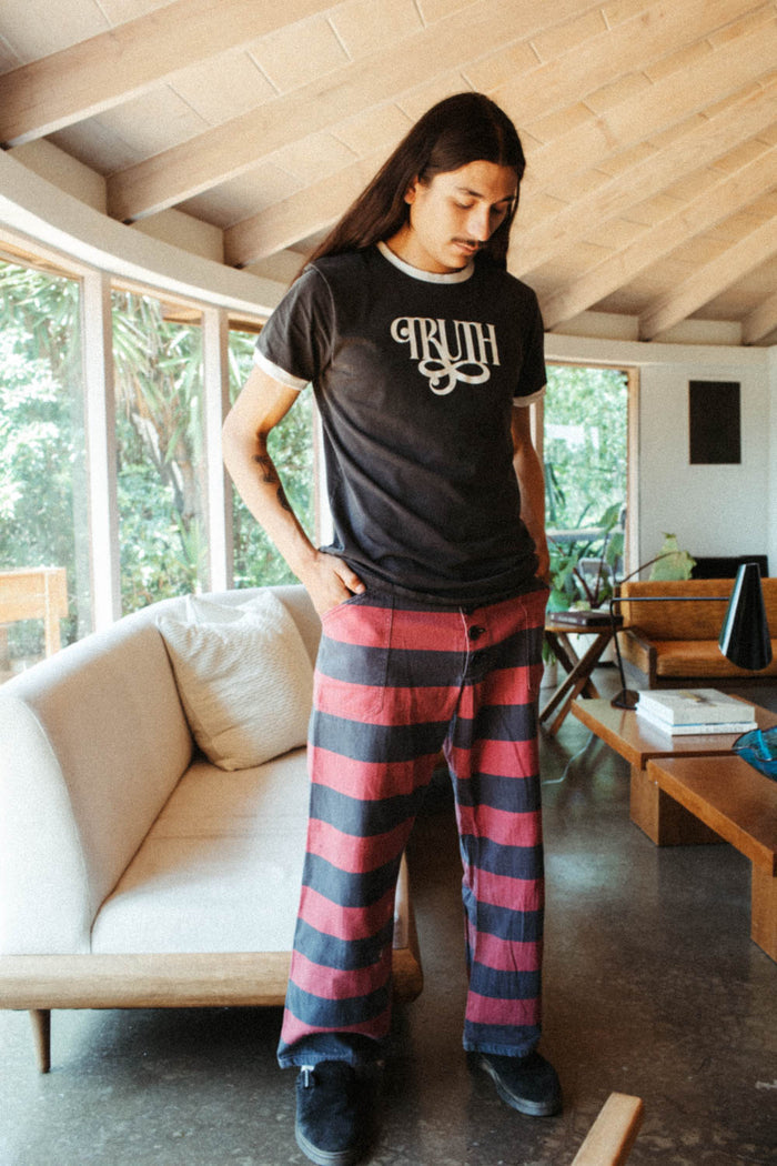 Man wearing Truth ringer tee shirt by The Bee & The Fox