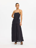 KIVARI Umi Maxi Dress in Charcoal – full-length front view showing tiered maxi skirt, model wearing women's charcoal spaghetti strap maxi dress