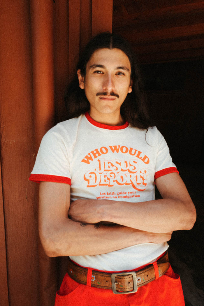 Man wearing Who Would Jesus Deport? Ringer Tee from The Bee & The Fox