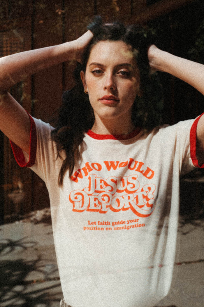Woman wearing Who Would Jesus Deport? Ringer Tee from The Bee & The Fox