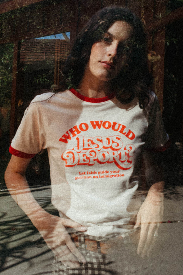 Woman wearing Who Would Jesus Deport? Ringer Tee from The Bee & The Fox